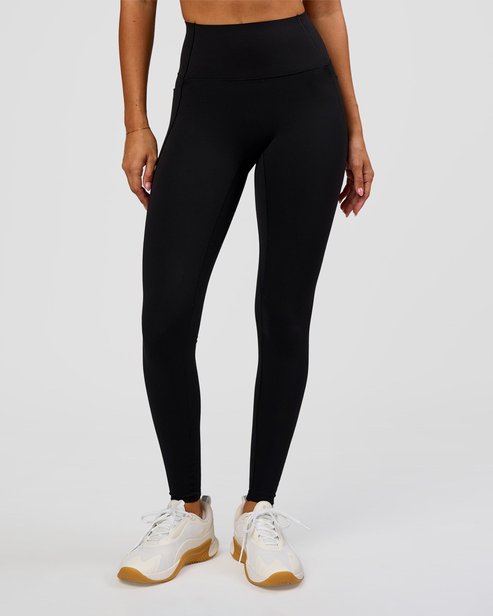 Woman wearing Fusion Bonded High-Rise Full Length Legging Pockets - Black | Model:Charli | Size:XS