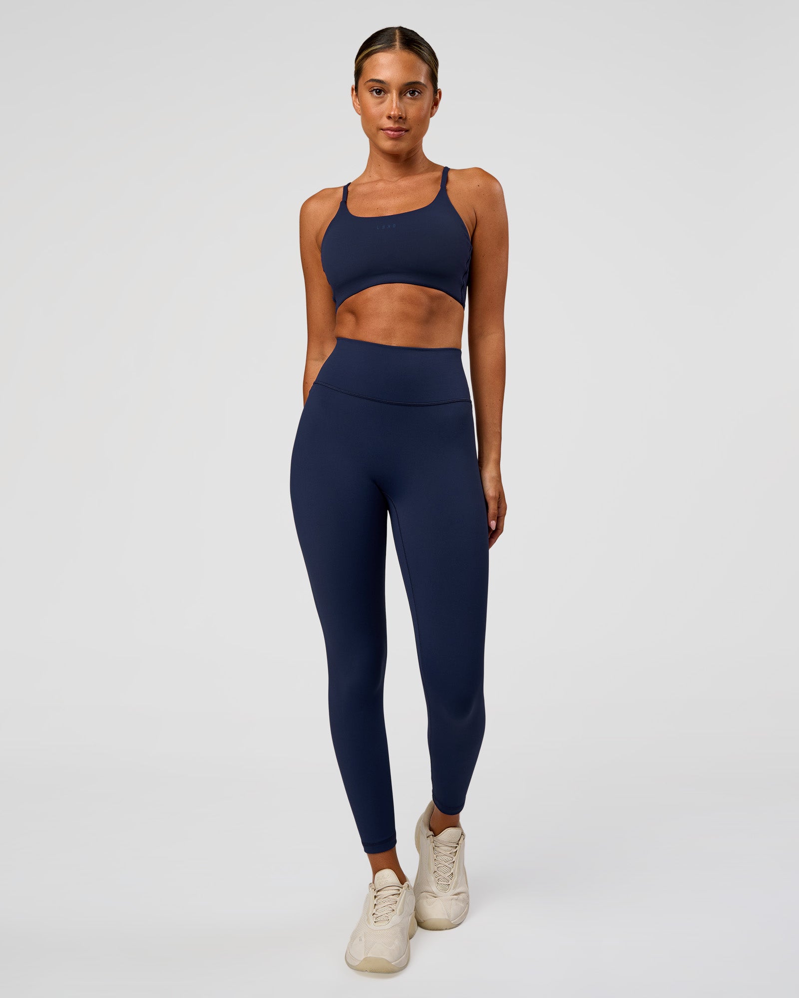 Woman wearing O.G. Fusion Ultra High-Rise Full Length Legging Pockets - Future Navy | Model:Charli | Size:XS