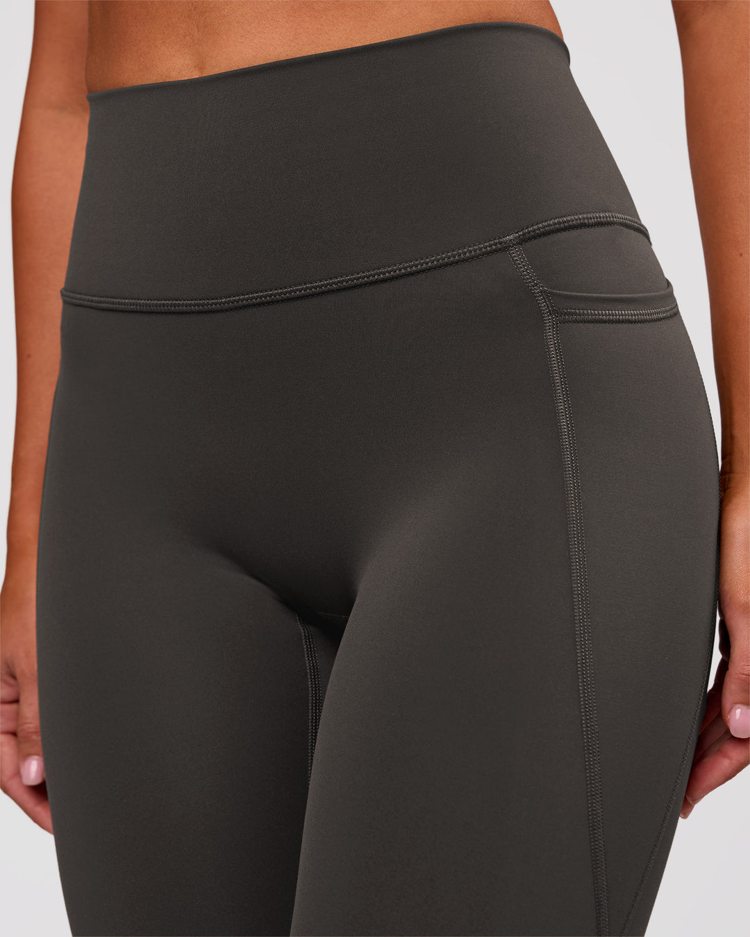 Woman wearing Fusion Ultra High-Rise Full Length Legging Pockets - Onyx | Model:Charli | Size:XS - view 7