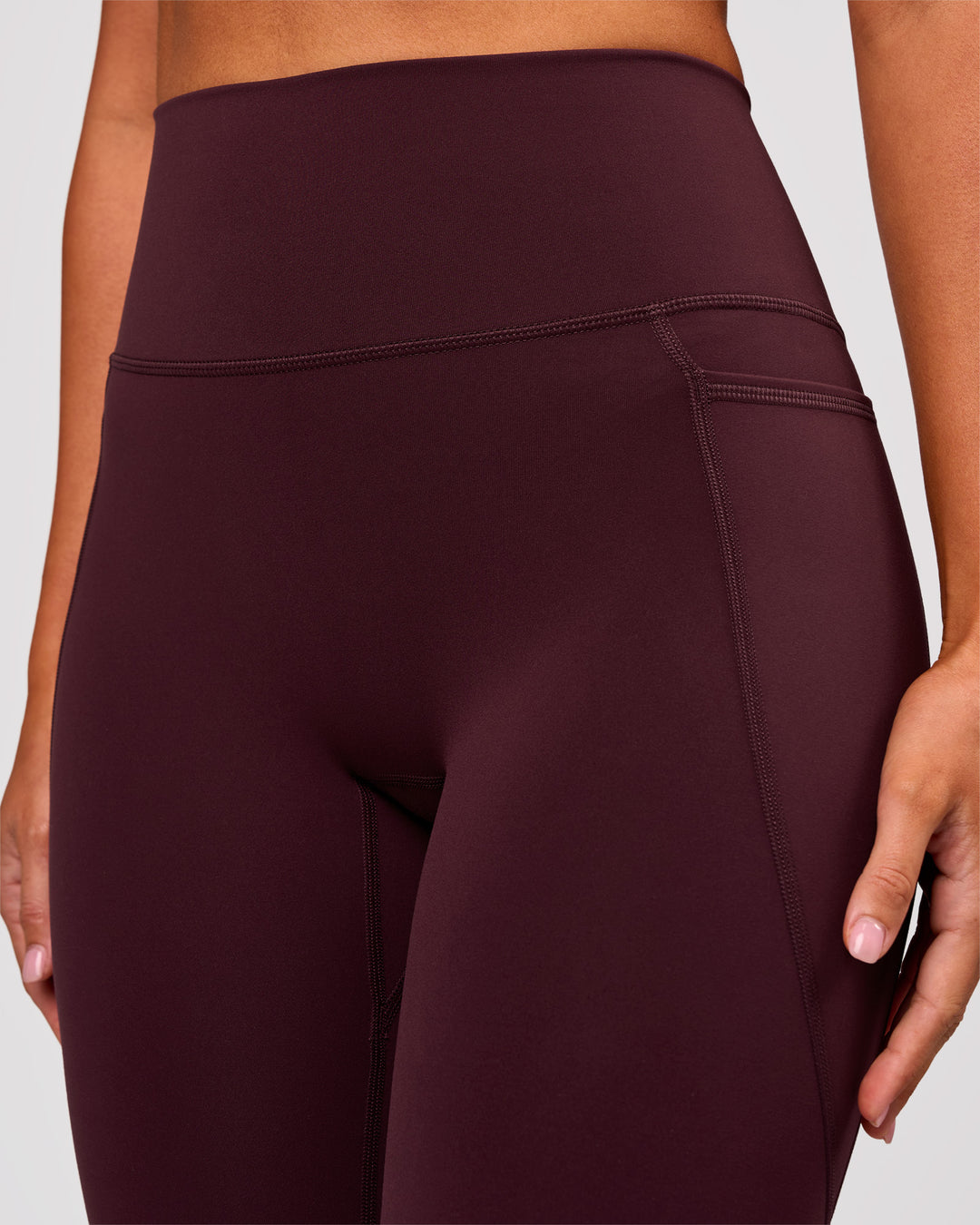 Woman wearing Fusion V Contour Ultra High-Rise 3/4 Legging Pockets - Cherry Lacquer | Model:Charli | Size:XS - view 6