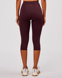 Woman wearing Fusion V Contour Ultra High-Rise 3/4 Legging Pockets - Cherry Lacquer | Model:Charli | Size:XS | Thumbnail Index: 7