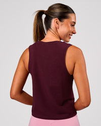 Woman wearing Go-To FLXCotton Midline Tank - Cherry Lacquer-White | Model:Charli | Size:XS | Thumbnail Index: 1