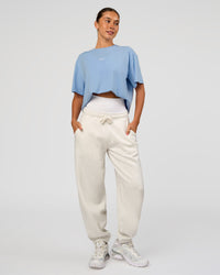 Woman wearing Go-To Script FLXCotton Oversized Tee - Open Air | Model:Charli | Size:XS