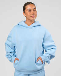 Woman wearing Go-To Script Oversized Hoodie - Open Air | Model:Charli | Size:XS