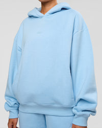 Woman wearing Go-To Script Oversized Hoodie - Open Air | Model:Charli | Size:XS