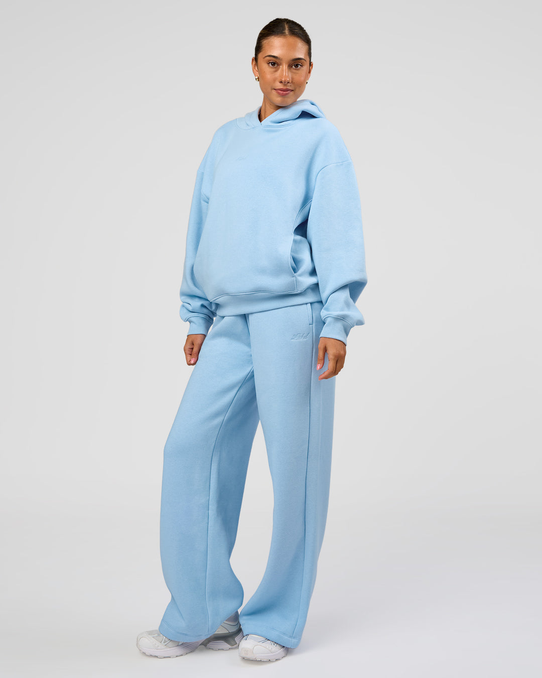 Woman wearing Go-To Script Wide Leg Track Pant - Open Air | Model:Charli | Size:XS