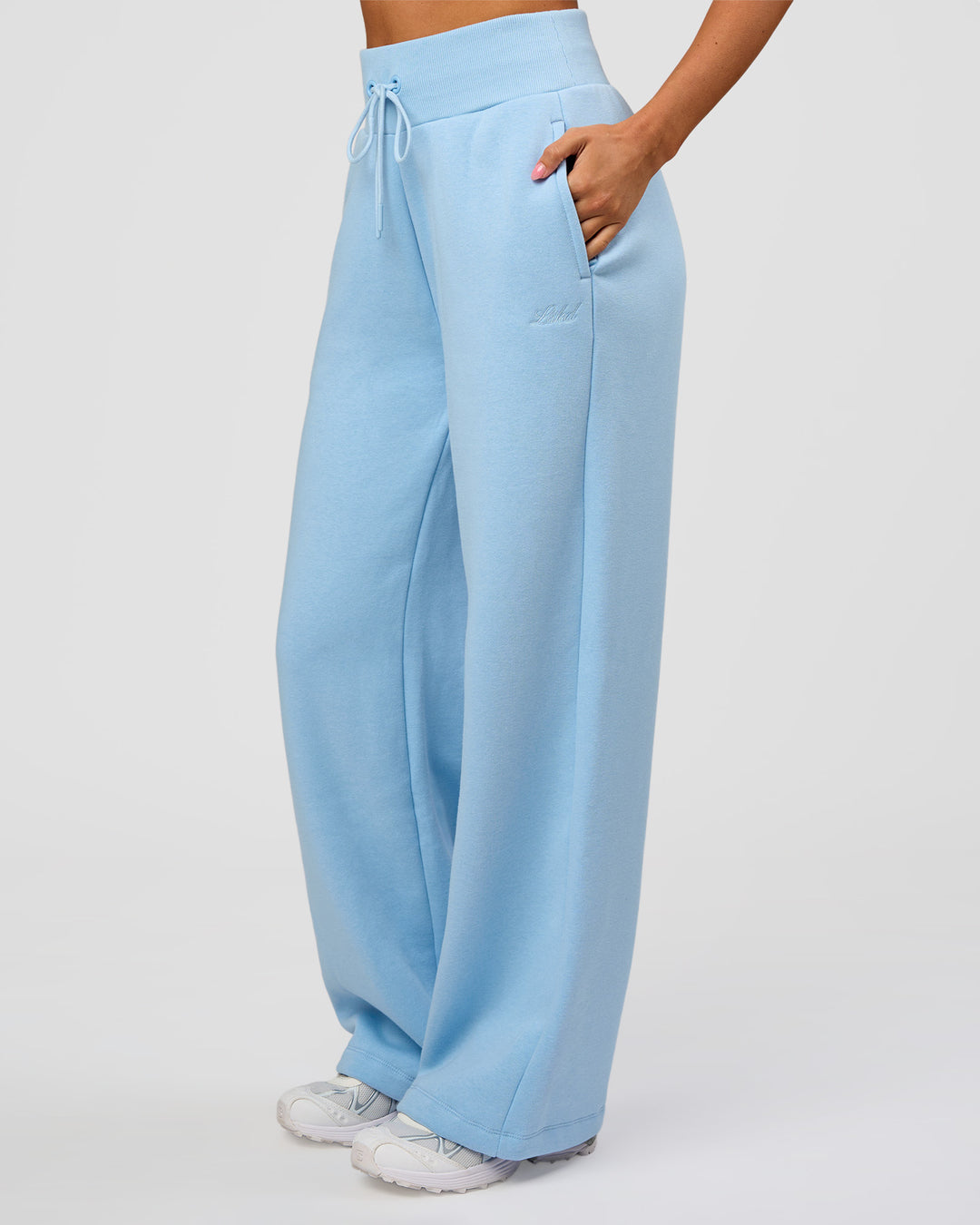Woman wearing Go-To Script Wide Leg Track Pant - Open Air | Model:Charli | Size:XS