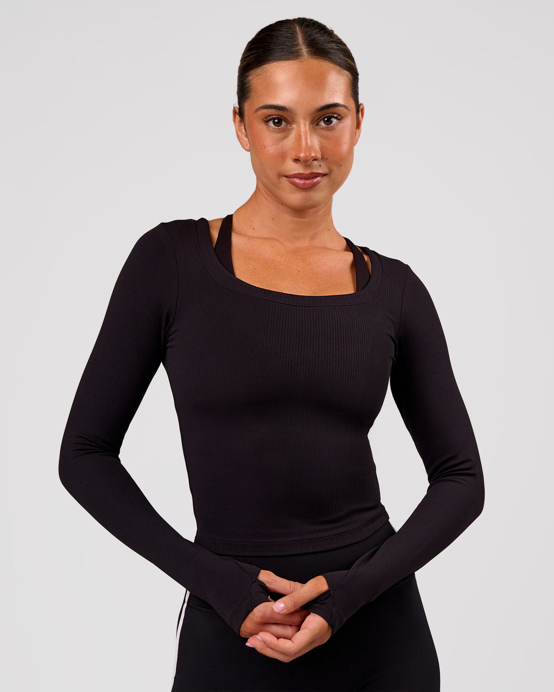 Woman wearing Horizon Long Sleeve Tee - Black | Model:Charli | Size:XS - view 1