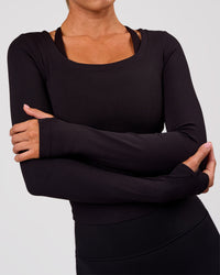 Woman wearing Horizon Long Sleeve Tee - Black | Model:Charli | Size:XS | Thumbnail Index: 2
