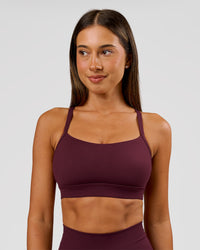 Woman wearing Momentum Sports Bra D/DD/E - Cherry Lacquer | Model:Charli | Size:XS | Thumbnail Index: 2