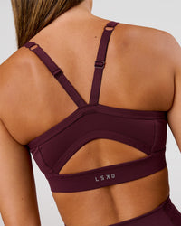 Woman wearing Momentum Sports Bra D/DD/E - Cherry Lacquer | Model:Charli | Size:XS | Thumbnail Index: 1