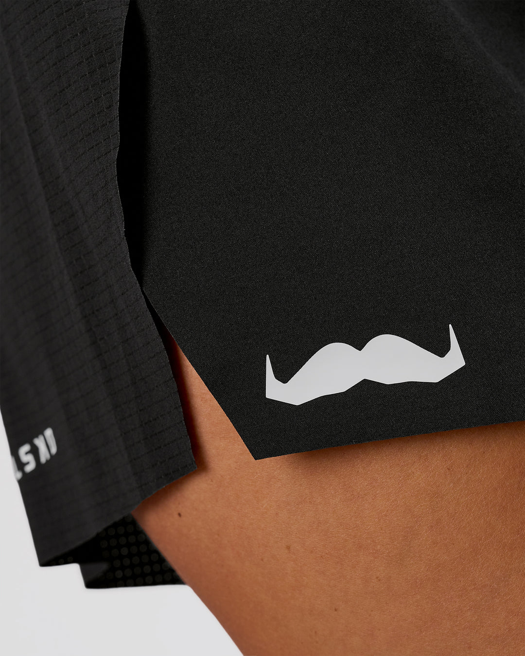 Woman wearing Movember x LSKD Accelerate 3" High-Rise Running Short - Black | Model:Charli | Size:XS - view 12