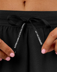 Woman wearing Movember x LSKD Accelerate 3" High-Rise Running Short - Black | Model:Charli | Size:XS | Thumbnail Index: 13