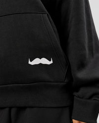 Woman wearing Movember x LSKD Oversized Hoodie - Black | Model:Charli | Size:XS | Thumbnail Index: 9