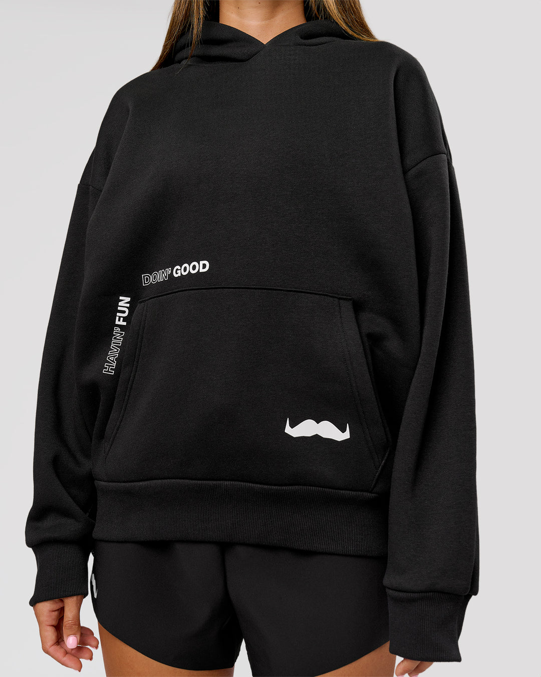 Woman wearing Movember x LSKD Oversized Hoodie - Black | Model:Charli | Size:XS - view 14
