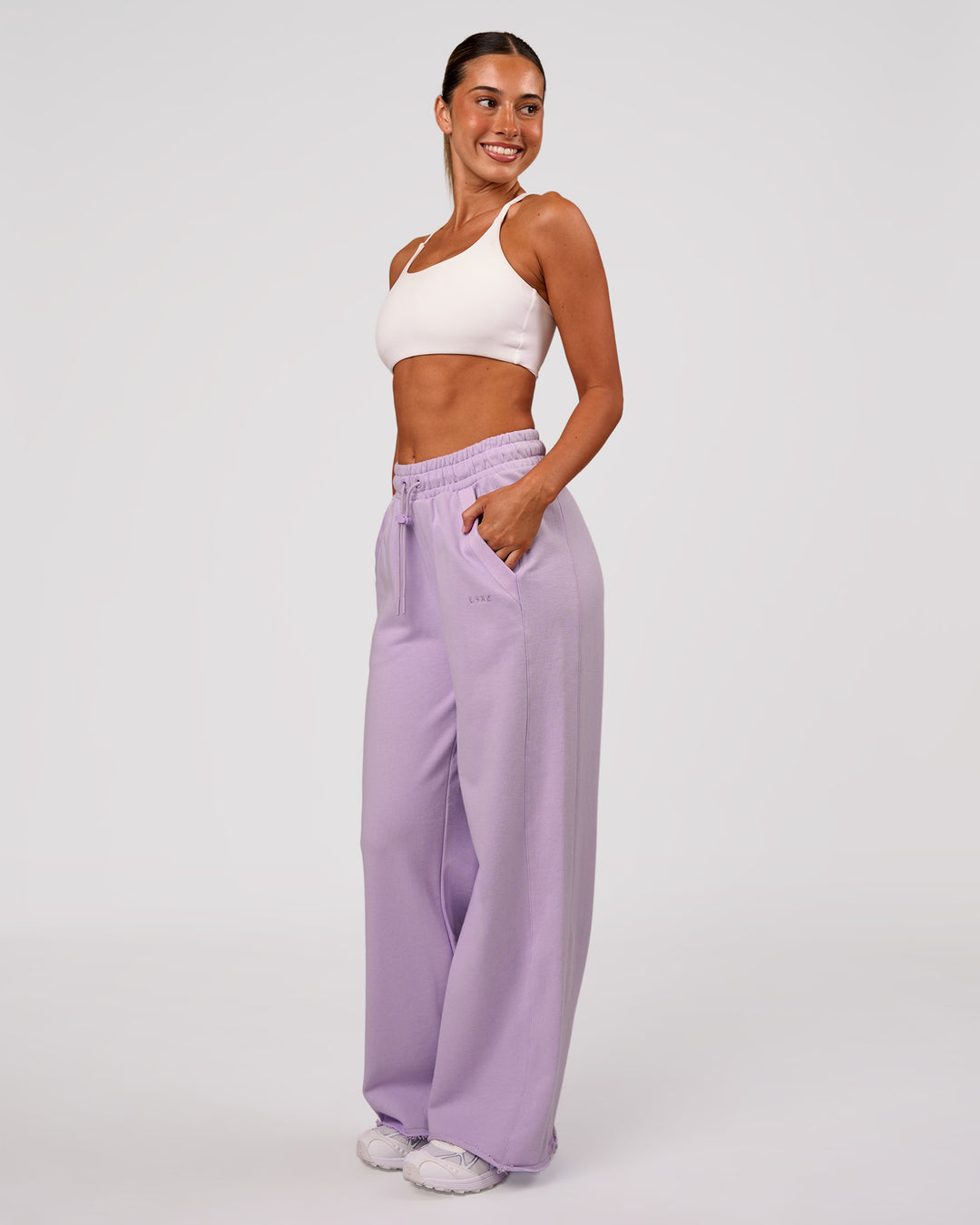 Woman wearing MVP Elite Terry Wide Leg Pant - Pale Lilac | Model:Charli | Size:XS - view 4