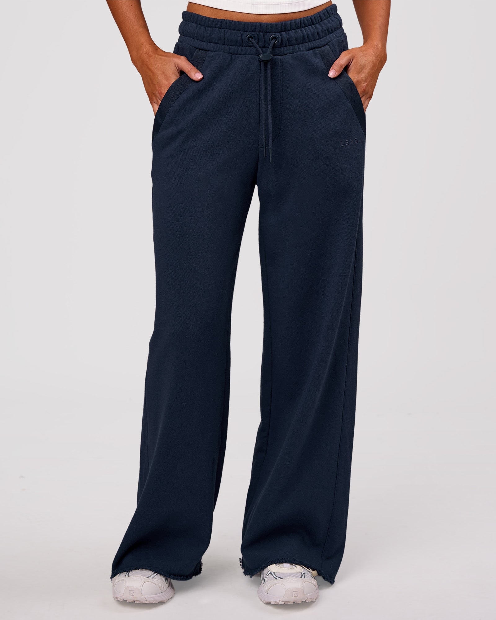 Woman wearing MVP Elite Terry Wide Leg Pant - Future Navy | Model:Charli | Size:XS