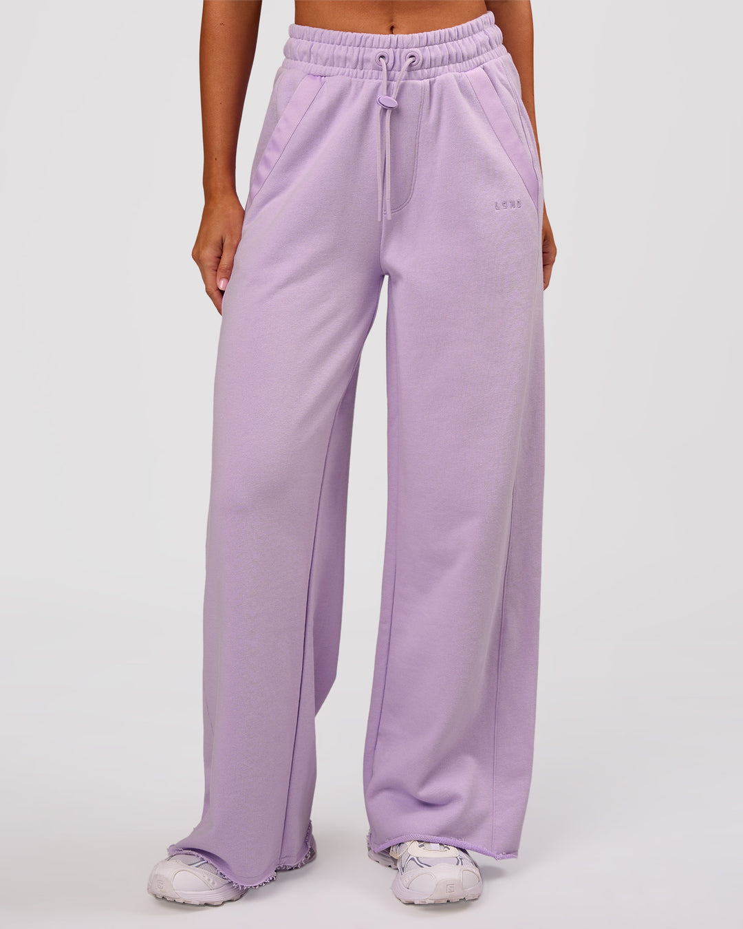 Woman wearing MVP Elite Terry Wide Leg Pant - Pale Lilac | Model:Charli | Size:XS - view 1