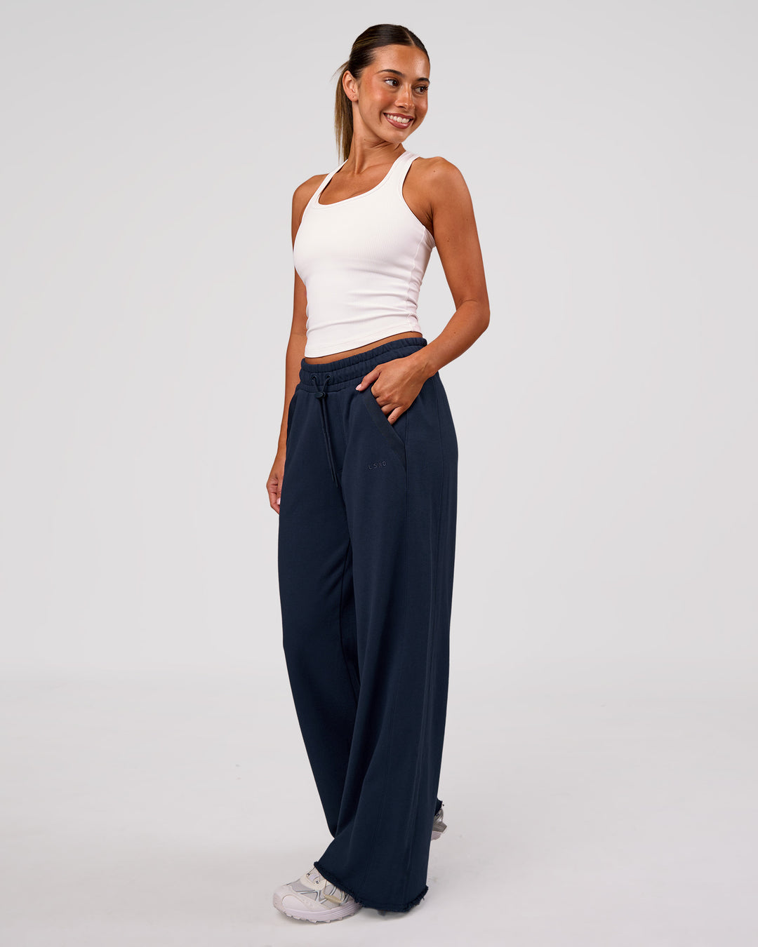 Woman wearing MVP Elite Terry Wide Leg Pant - Future Navy | Model:Charli | Size:XS - view 7