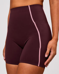 Woman wearing Power Ultra High-Rise 6" Short Pockets - Cherry Lacquer-Pink Rose | Model:Charli | Size:XS | Thumbnail Index: 0