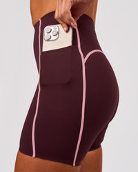 Woman wearing Power Ultra High-Rise 6" Short Pockets - Cherry Lacquer-Pink Rose | Model:Charli | Size:XS | Thumbnail Index: 2