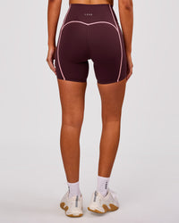 Woman wearing Power Ultra High-Rise 6" Short Pockets - Cherry Lacquer-Pink Rose | Model:Charli | Size:XS | Thumbnail Index: 5