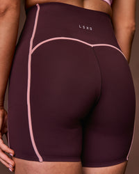 Woman wearing Power Ultra High-Rise 6" Short Pockets - Cherry Lacquer-Pink Rose | Model:Charli | Size:XS | Thumbnail Index: 8