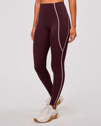 Woman wearing Power Ultra High-Rise Full Length Legging Pockets - Cherry Lacquer-Pink Rose | Model:Charli | Size:XS | Thumbnail Index: 0