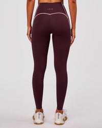 Woman wearing Power Ultra High-Rise Full Length Legging Pockets - Cherry Lacquer-Pink Rose | Model:Charli | Size:XS | Thumbnail Index: 2