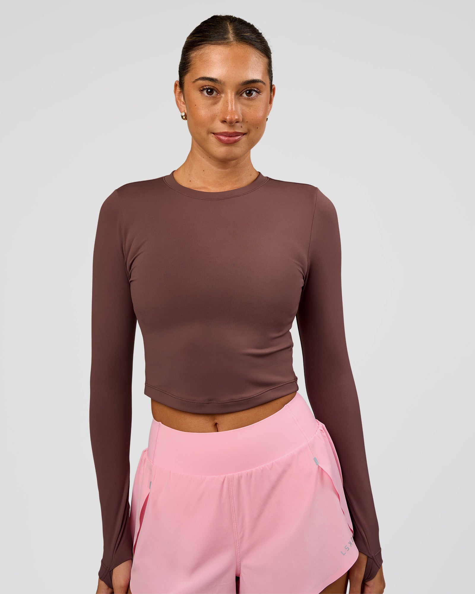 Woman wearing Staple Long Sleeve Cropped Tee 2.0 - Cocoa Powder | Model:Charli | Size:XS