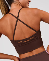 Woman wearing Stellar Long Line Sports Bra - Hot Chocolate | Model:Charli | Size:XS | Thumbnail Index: 0
