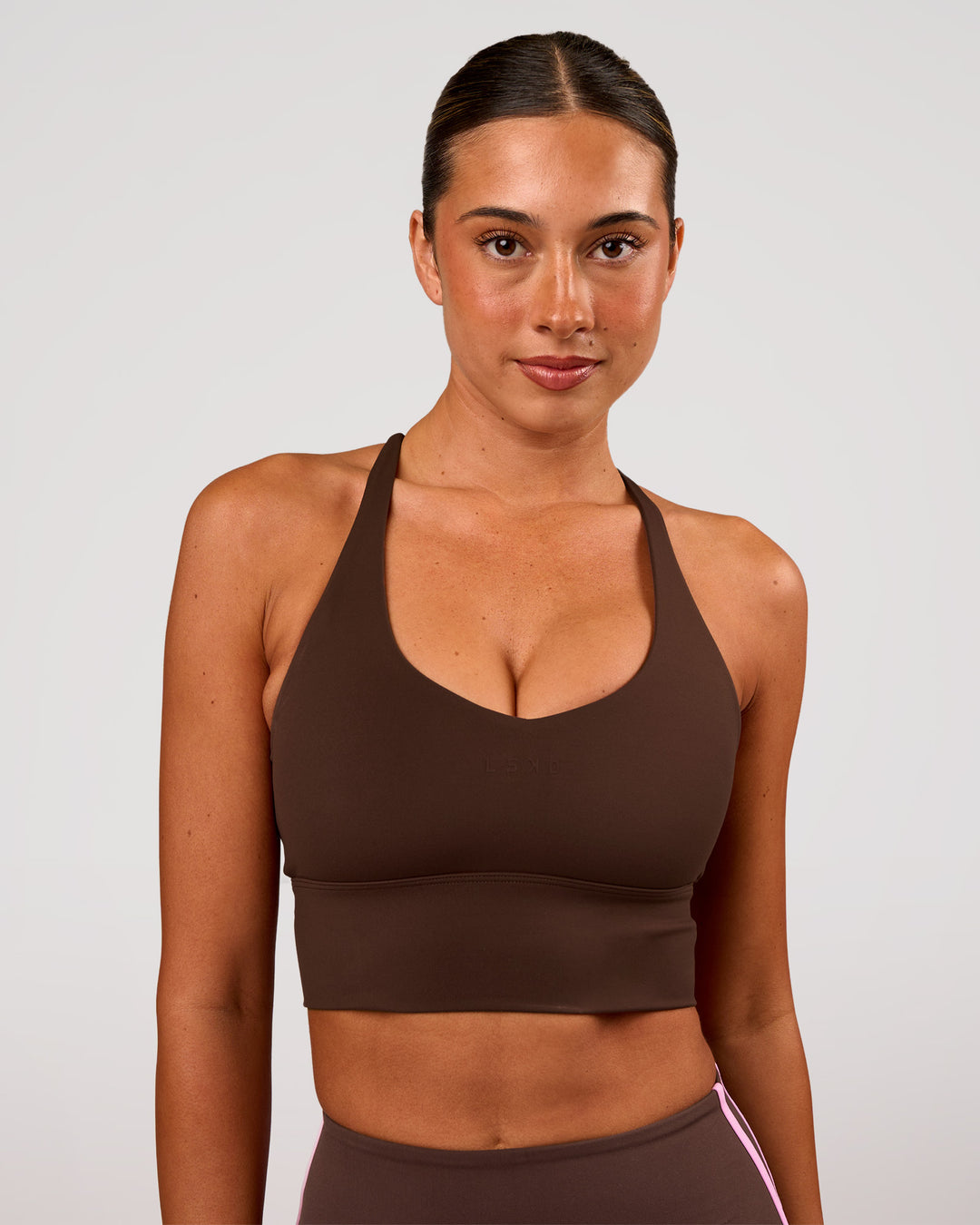Woman wearing Stellar Long Line Sports Bra - Hot Chocolate | Model:Charli | Size:XS - view 4