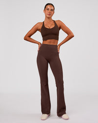 Woman wearing Stellar Long Line Sports Bra - Hot Chocolate | Model:Charli | Size:XS | Thumbnail Index: 4