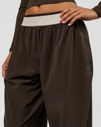 Woman wearing Stride Wide Leg Pant - Ground Coffee | Model:Charli | Size:XS | Thumbnail Index: 6
