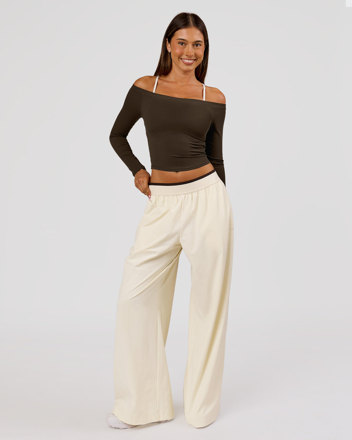 Woman wearing Stride Wide Leg Pant - Vanilla Bean | Model:Charli | Size:XS - view 1