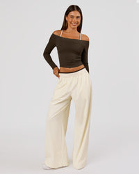 Woman wearing Stride Wide Leg Pant - Vanilla Bean | Model:Charli | Size:XS | Thumbnail Index: 0