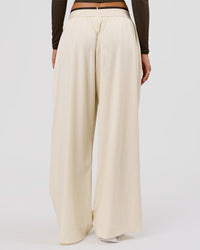 Woman wearing Stride Wide Leg Pant - Vanilla Bean | Model:Charli | Size:XS | Thumbnail Index: 2