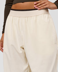 Woman wearing Stride Wide Leg Pant - Vanilla Bean | Model:Charli | Size:XS | Thumbnail Index: 5
