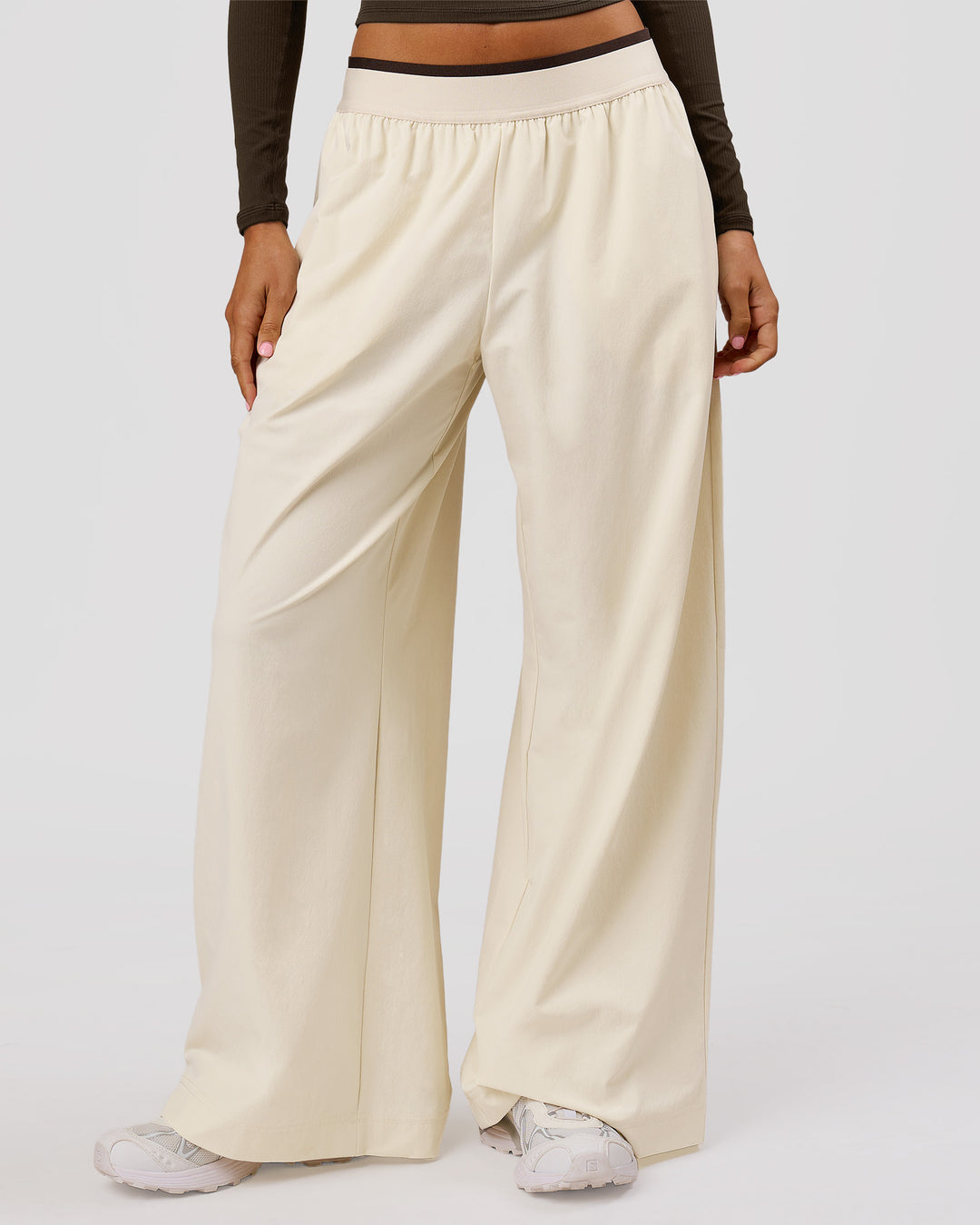 Woman wearing Stride Wide Leg Pant - Vanilla Bean | Model:Charli | Size:XS - view 7