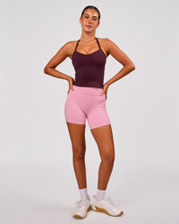 Woman wearing Unleash Shelf Bra Tank - Cherry Lacquer | Model:Charli | Size:XS | Thumbnail Index: 4