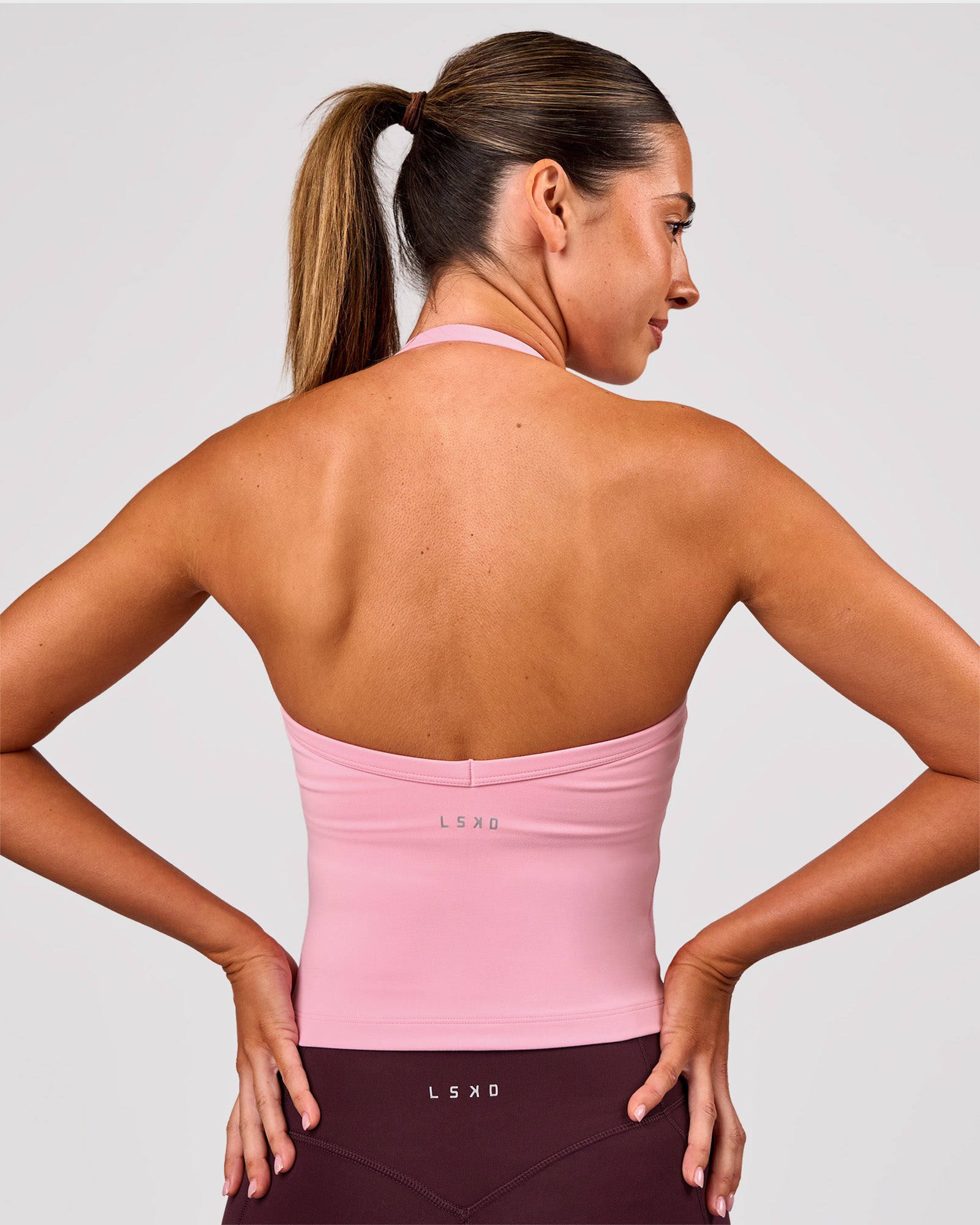 Woman wearing Unleash Shelf Bra Tank - Pink Rose | Model:Charli | Size:XS