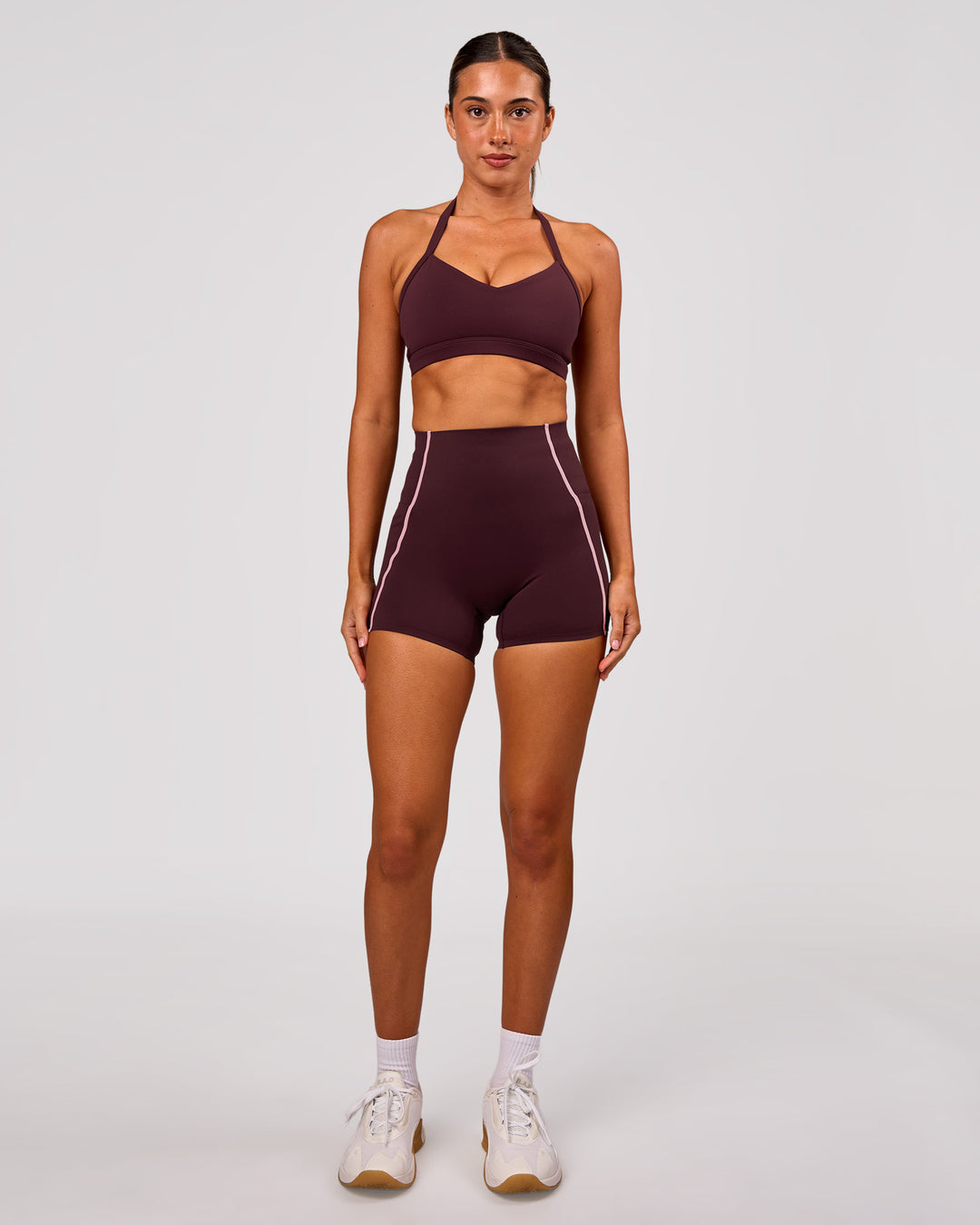 Woman wearing Unleash Sports Bra - Cherry Lacquer | Model:Charli | Size:XS - view 4