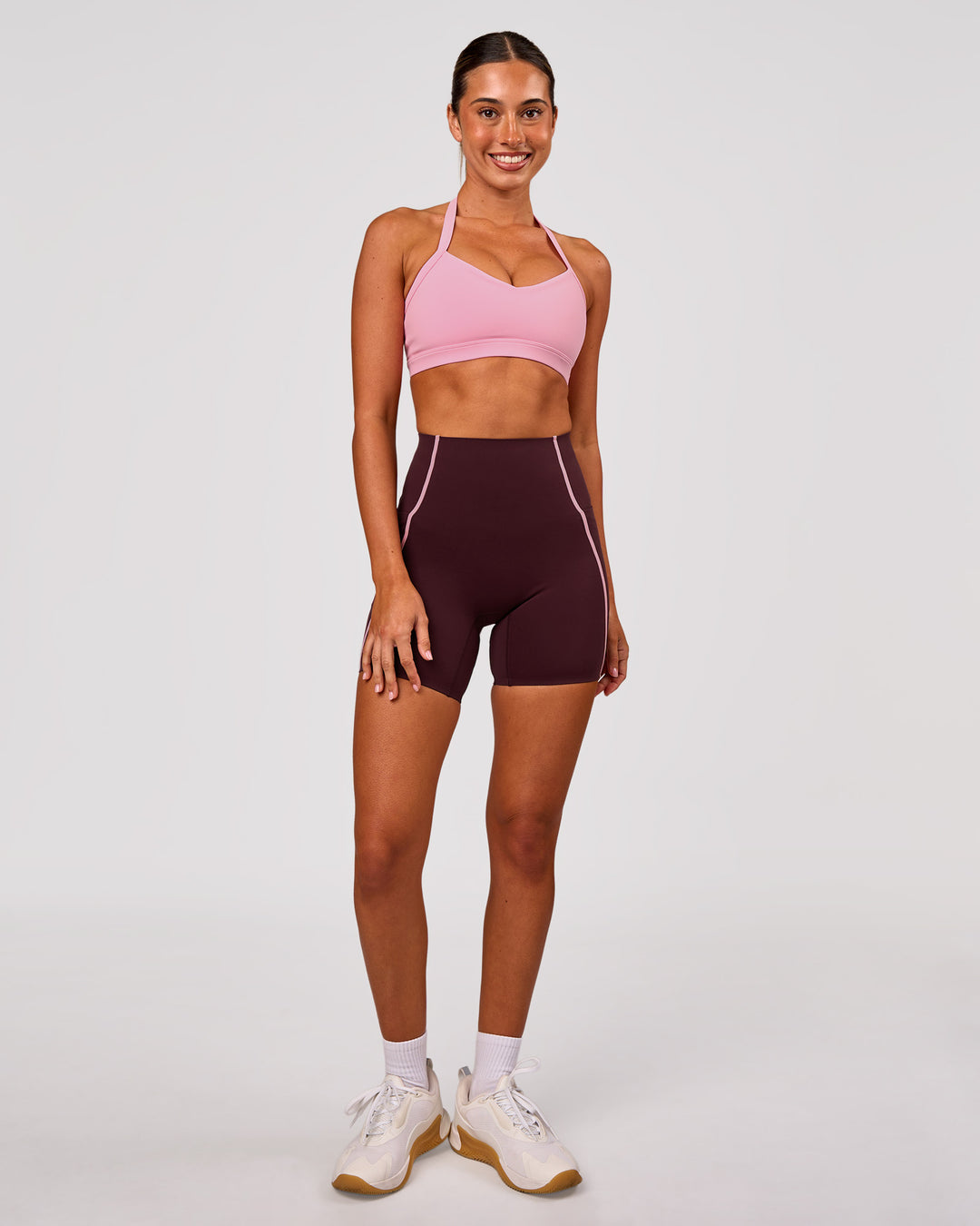 Woman wearing Unleash Sports Bra - Pink Rose | Model:Charli | Size:XS - view 5