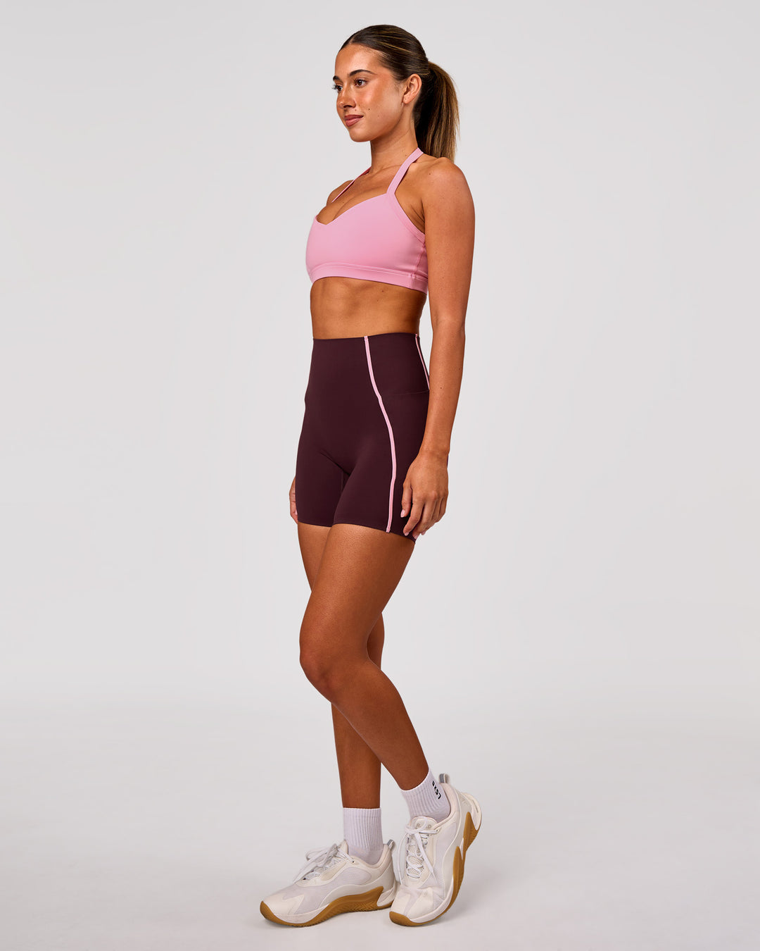 Woman wearing Unleash Sports Bra - Pink Rose | Model:Charli | Size:XS - view 6