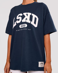 Woman wearing Varsity EST Heavyweight Oversized Tee  - Future Navy-White | Model:Charli | Size:XS | Thumbnail Index: 6