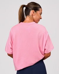 Woman wearing Varsity EST Heavyweight Oversized Tee  - Pink Rose-Future Navy | Model:Charli | Size:XS | Thumbnail Index: 3