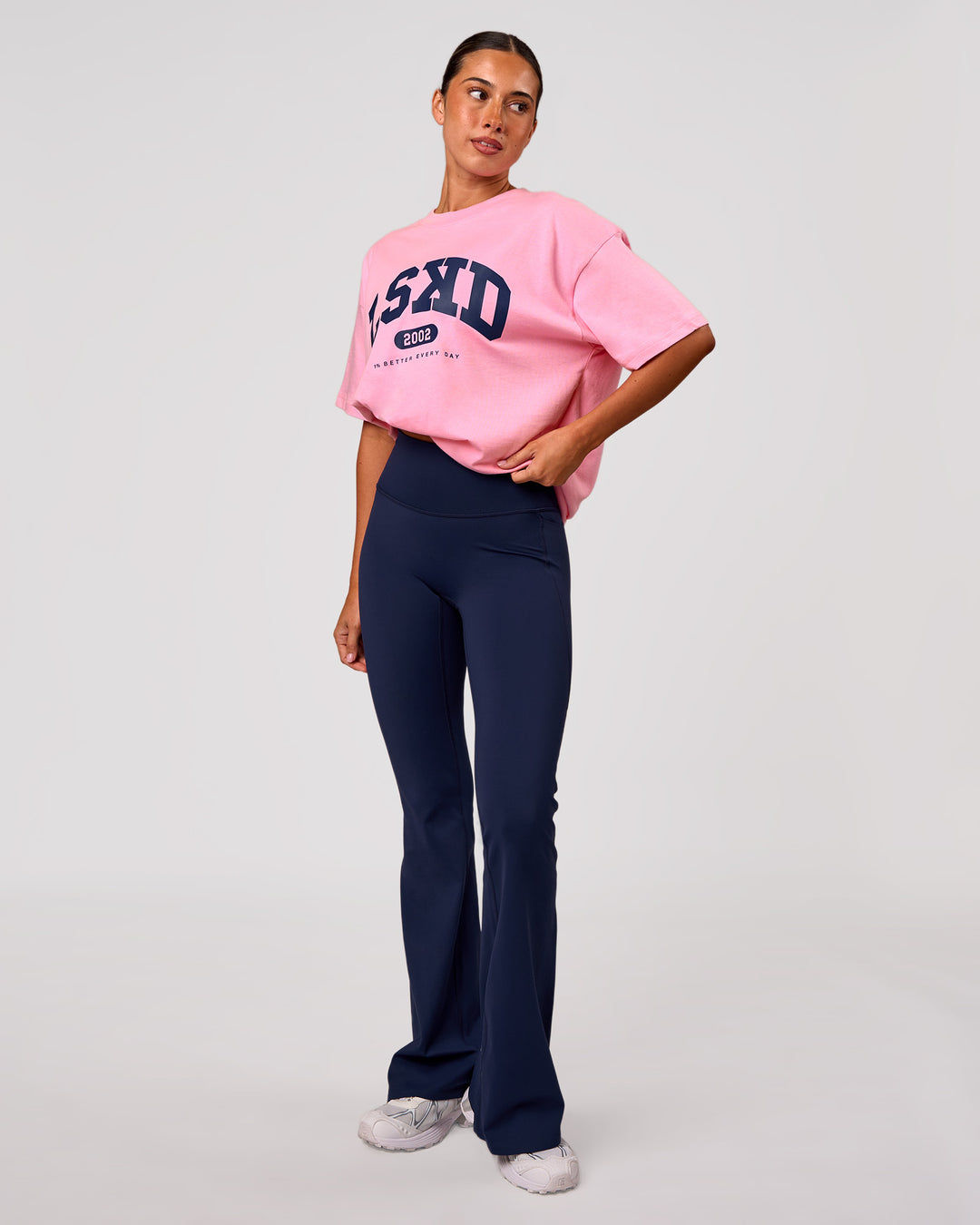 Woman wearing Varsity EST Heavyweight Oversized Tee  - Pink Rose-Future Navy | Model:Charli | Size:XS - view 5