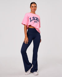Woman wearing Varsity EST Heavyweight Oversized Tee  - Pink Rose-Future Navy | Model:Charli | Size:XS | Thumbnail Index: 5