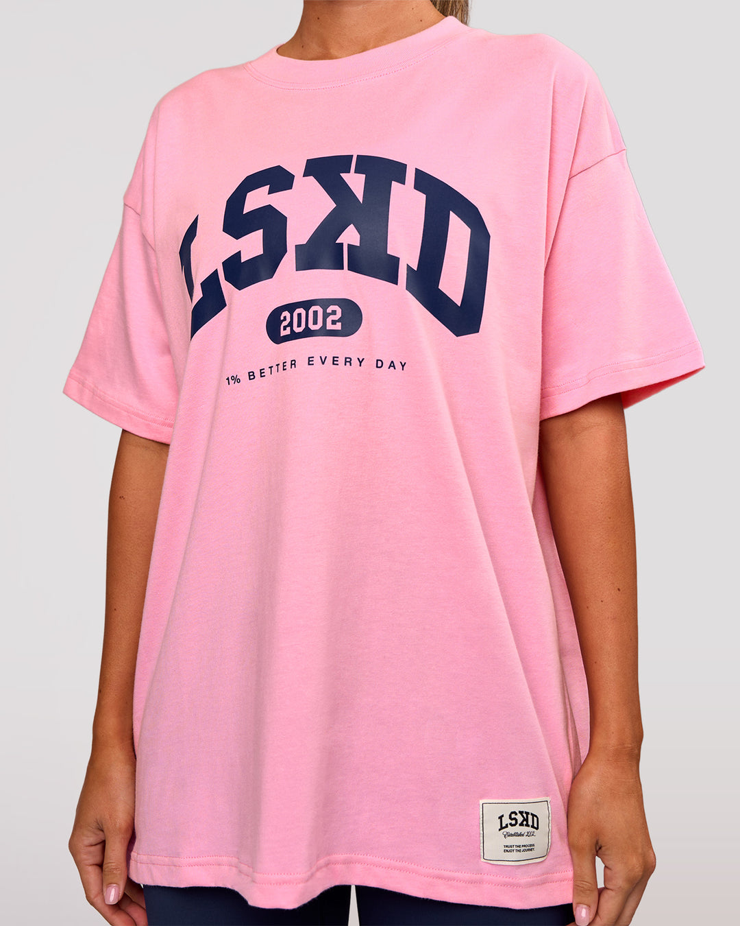 Woman wearing Varsity EST Heavyweight Oversized Tee  - Pink Rose-Future Navy | Model:Charli | Size:XS - view 7