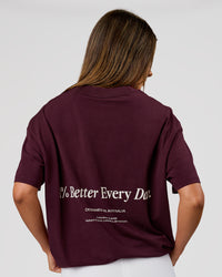 Woman wearing VS26 1% Better FLXCotton Oversize Tee - Cherry Lacquer-Off White | Model:Charli | Size:XS | Thumbnail Index: 2